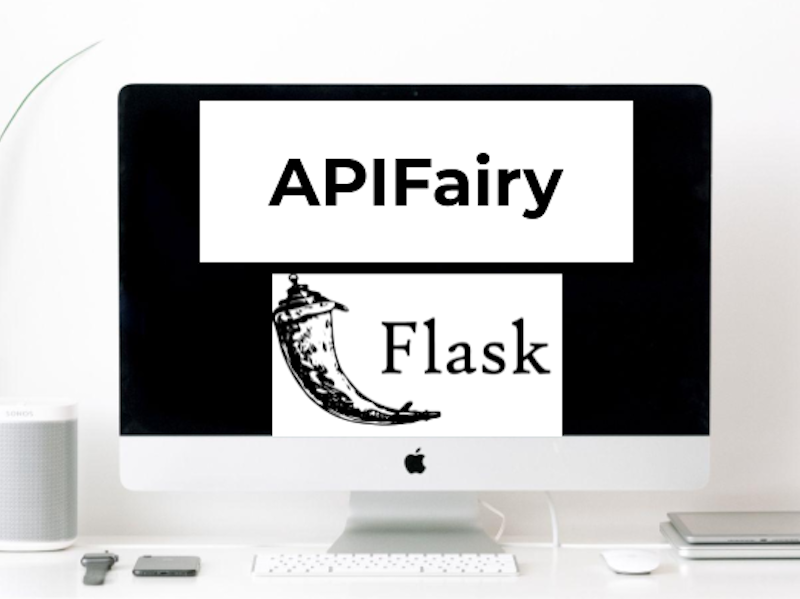 Desktop Computer on a Desk with the Flask and APIFairy Logos on the screen.