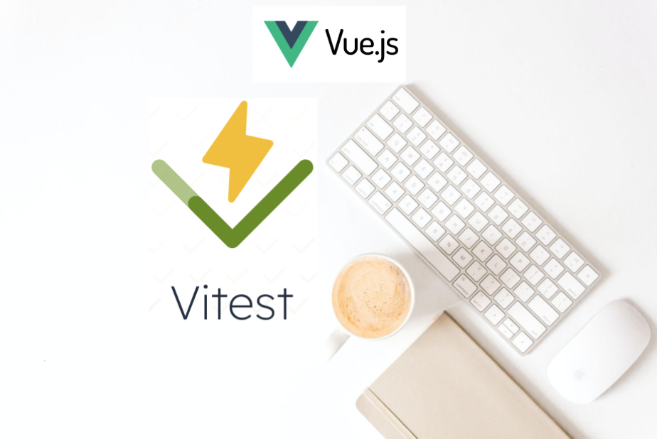 White desktop with the VueJS and Vitest logos on the desk.